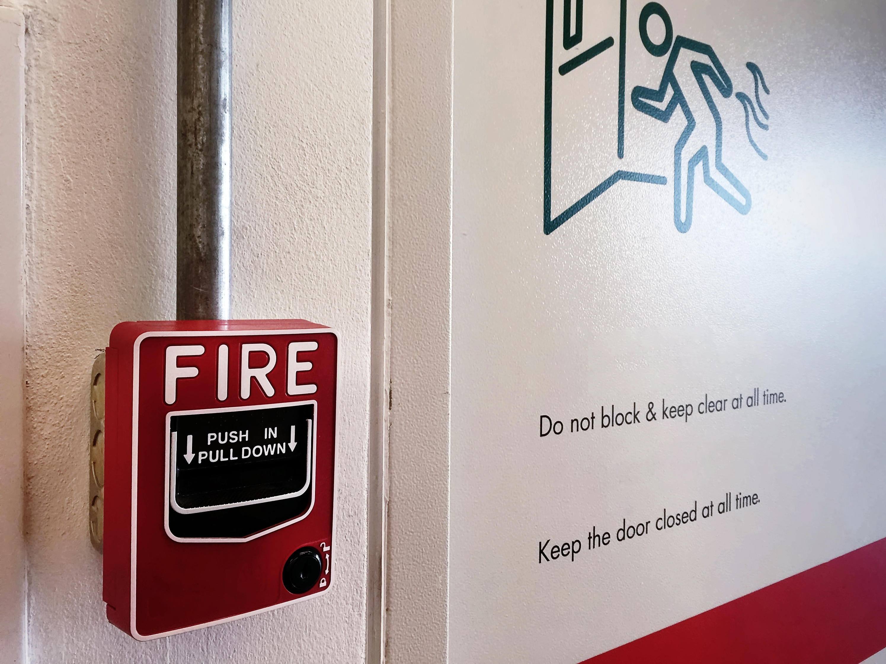 Installed fire alarm device with conduit